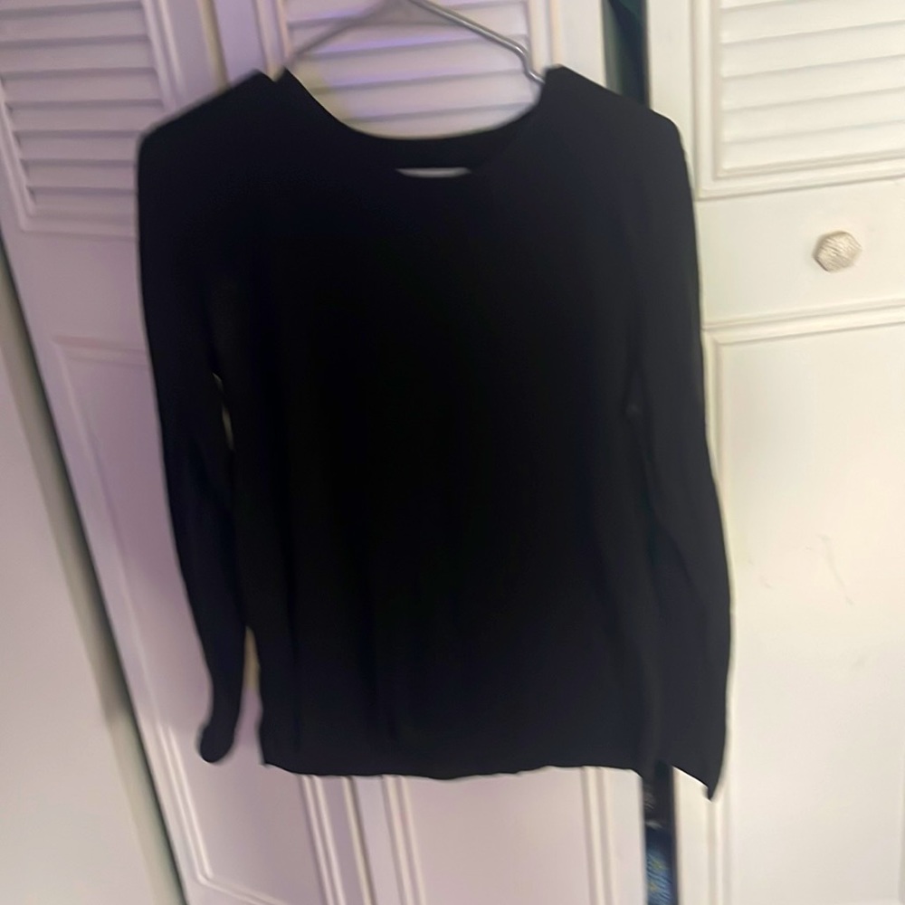 This is a black fitted shirt it is so soft